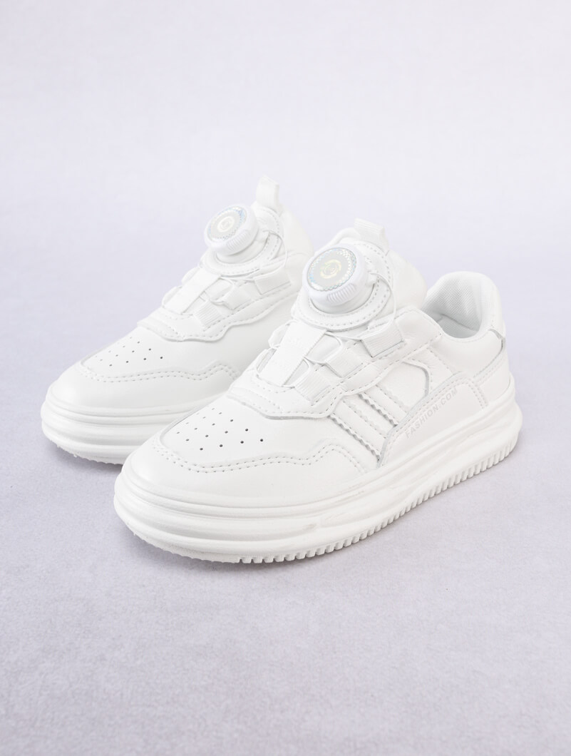 Baskets blanches à bouton rotatif